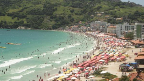 Prainha Aconchegante apto de quarto e sala com vista para o mar
